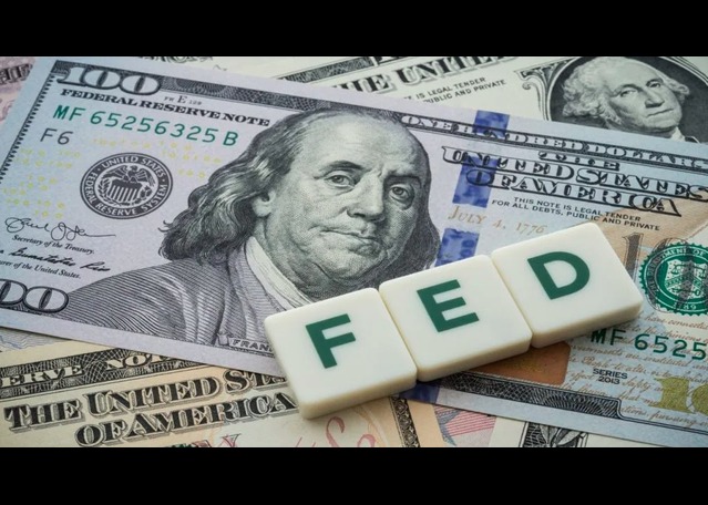 Dollar Strengthens on Fed Outlook 